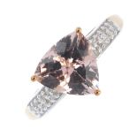 A 9ct gold morganite and diamond ring. The triangular-shape morganite, to the pave-set diamond