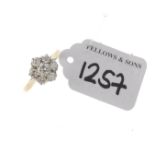 (PWN680B) An 18ct gold diamond floral cluster ring. Estimated total diamond weight 1ct. Hallmarks.