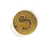 (127427) A signet ring. Designed as a circular panel, with embossed 'S'. Ring size J 1/2. Weight 4.