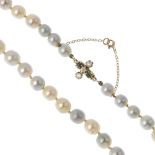 A late Victorian diamond and emerald clasp, on cultured pearl necklace. The old-cut diamond line and