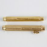 An 18ct gold Sampson Mordan & Co. retractable pencil of telescopic form with further Asprey