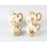 Four Royal Worcester porcelain flatback jugs, comprising a pair plus two smaller, each decorated