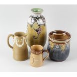 A mixed selection of Royal Doulton items, to include a foliate vase, a jar (lacking cover), a