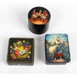 A small group of various lacquer boxes, to include one having over-painted scene of a female