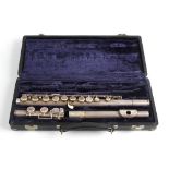 A cased white metal flute, Artley Nogales Arizona, of three sections, the largest numbered 363049,