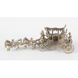 An Edward VII silver model of the Coronation coach, hallmarked Chester 1902, 8.5” (21.5cm) long, (