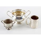 A small selection of silver items, to include an early 20th century christening mug, of tapered