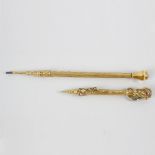 Two yellow metal and gem set Sampson Mordan & Co. retractable pencils. The first having foliate