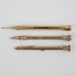 A Sampson Mordan & Co. yellow metal combination retractable pencil and fountain pen, the barrel of