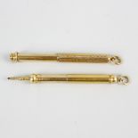 Two Sampson Mordan & Co. yellow metal retractable pencils. The first of plain telescopic form with