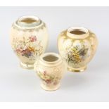 A group of Royal Worcester porcelain items, each decorated with flowers upon a blush ivory ground,