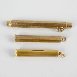 An 18ct gold cigar piercer, the hexagonal outer case enclosing cylindrical piercer and the whole