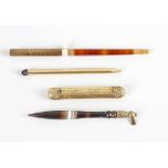 A group of assorted pens and pencils, comprising an early 20th century fountain pen having