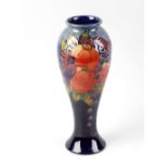 A Moorcroft pottery Finches pattern vase, by Sally Tuffin, of slender baluster form with a merging