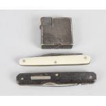 A Dunhill silver plated lighter, with engine turned textured body, 1.5 (3.5cm) square, together with