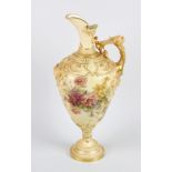 A large Royal Worcester porcelain blush ivory ewer, of ovoid form having a mask and cherub relief