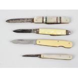 A group of twenty seven pen and pocket knives, to include numerous mother of pear examples, plus