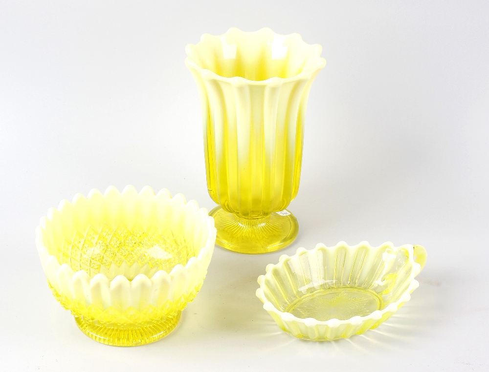 Three boxes containing a mixed selection of coloured glassware, of yellow, green and blue to include
