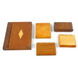 A selection of assorted wooden cigarette cases, etc. To include an example having floral carved