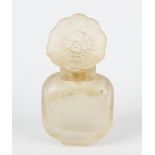 A French frosted glass scent bottle, of rounded square form having a further flower-head glass