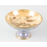 A Crown Devon ‘Lustrine’ pedestal bowl, c.1930, the peach ground interior decorated with a mermaid