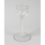 An 18th century cordial glass, having ogee bowl on air twist stem and circular foot, with etched