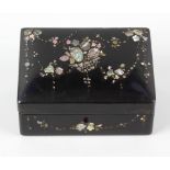 A 19th century Jennens & Bettridge black lacquered papier mache stationery box, the rectangular