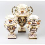 A mixed selection of Royal Crown Derby items, to include a pair of twin handled vases, a coffee