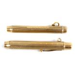 Two Sampson Mordan & Co. 9ct gold retractable pencils. Each of similar telescopic form, one having