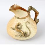 A Royal Worcester porcelain jug, of pear form having applied lizard to the woven-effect blush