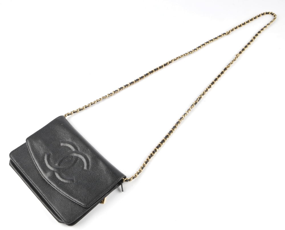 CHANEL - a caviar leather purse with chain. Featuring a black caviar leather exterior with raised CC - Image 6 of 7