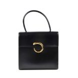 CARTIER - a black leather Panthere box bag. Designed with a smooth black leather exterior with a