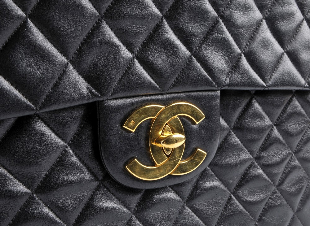 CHANEL - a Maxi Classic Flap handbag. Featuring maker's signature black quilted lambskin leather - Image 4 of 6