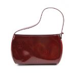 CARTIER - a Happy Birthday Bordeaux handbag. Designed with a structured shape, a burgundy monogram