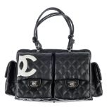 CHANEL - a Ligne Cambon reporter handbag. Featuring a black quilted lambskin leather exterior with