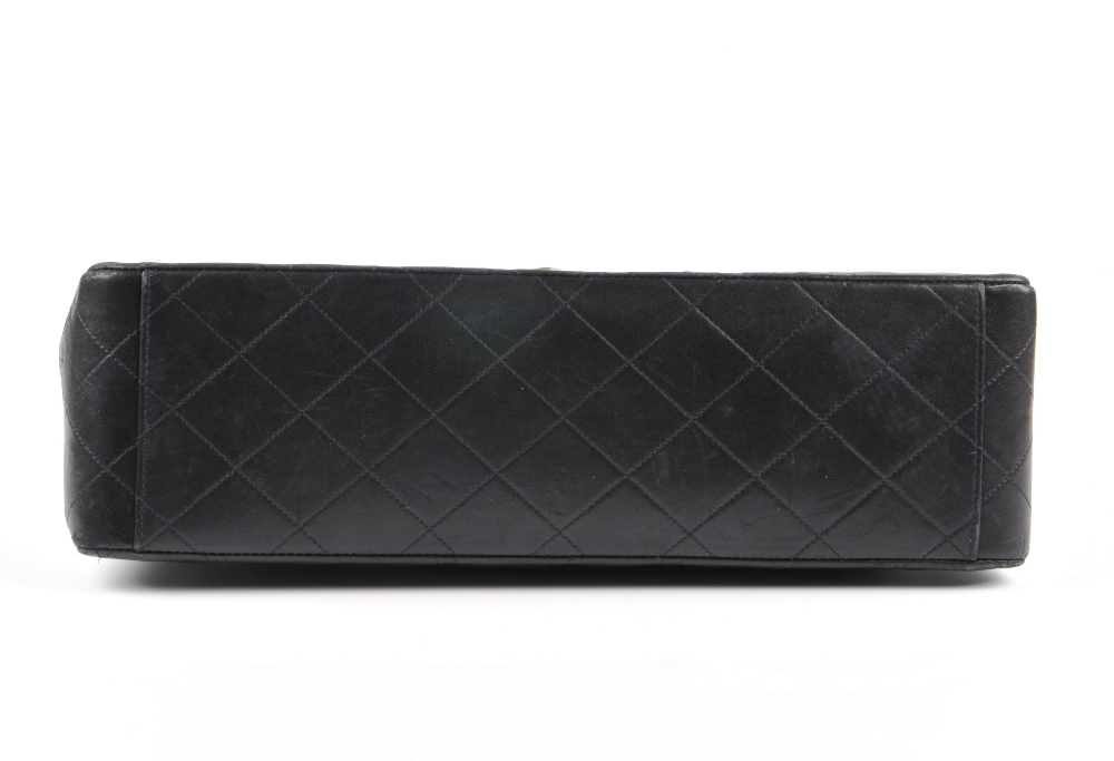 CHANEL - a Maxi Classic Flap handbag. Featuring maker's signature black quilted lambskin leather - Image 5 of 6