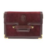CARTIER - a Bordeaux suede and leather handbag. Designed with a burgundy suede exterior with
