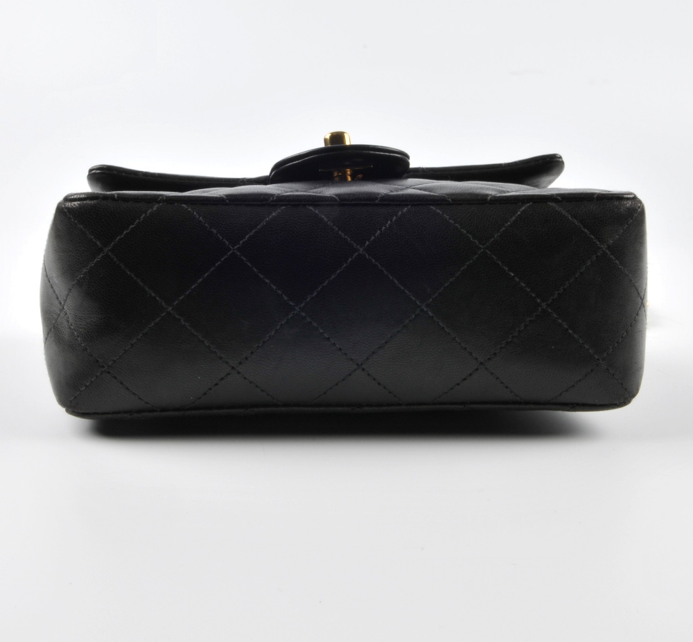 CHANEL - a Mini Classic Flap handbag. Featuring maker's signature black quilted lambskin leather - Image 5 of 7