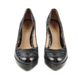 FENDI - a pair of brown crocodile leather platform court shoes. Designed with a wooden platform sole