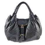 FENDI - a Spy handbag. Designed with a soft black leather exterior, braided handles and trim,