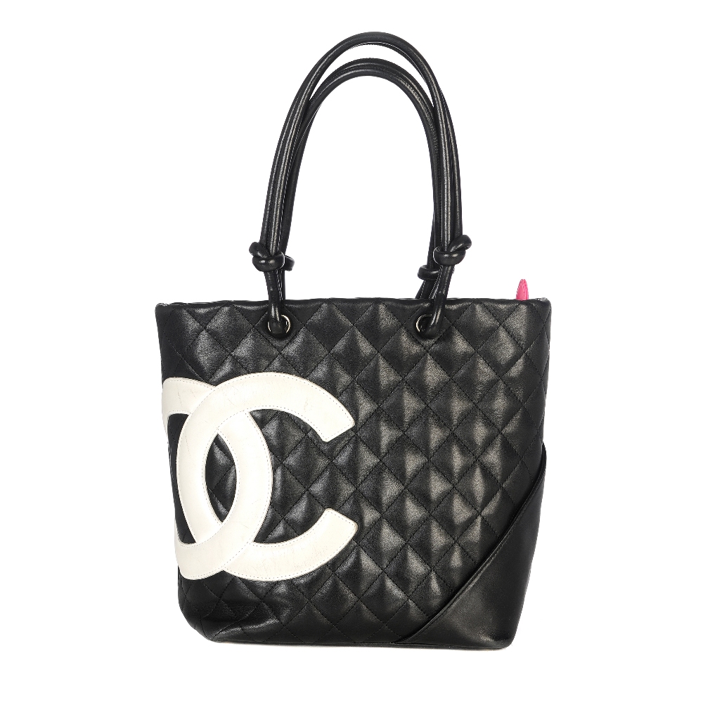 CHANEL - a Ligne Cambon quilted tote handbag. Featuring a smooth black lambskin leather exterior
