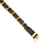 CHANEL - a chain belt. The brushed gold-tone oversized curb-link chain with maker's signature