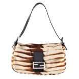 FENDI - a baguette handbag. Featuring brown and cream animal print pony hair exterior with smooth