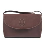 CARTIER - a Bordeaux leather handbag. Designed with maker's classic burgundy leather exterior and