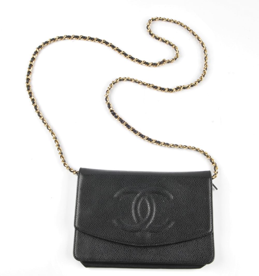 CHANEL - a caviar leather purse with chain. Featuring a black caviar leather exterior with raised CC - Image 5 of 7