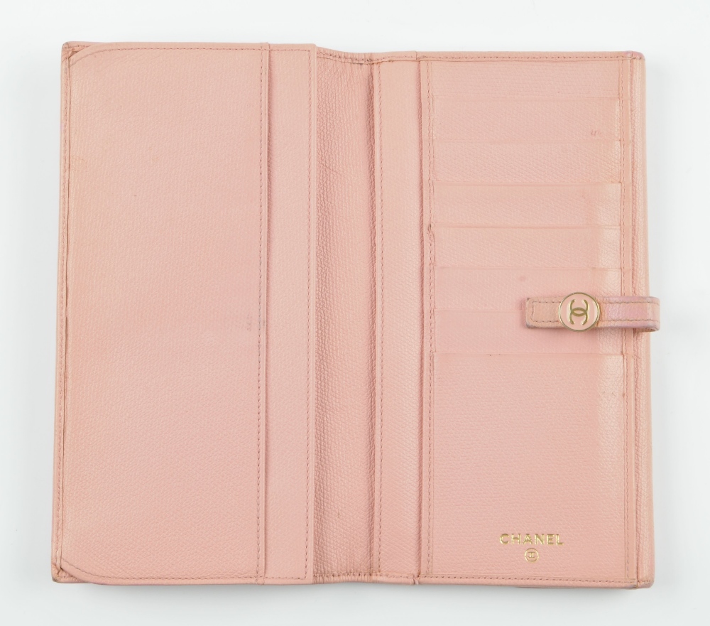 CHANEL - a pink leather wallet. The bifold wallet with press-stud fastening and pink enamel button - Image 3 of 5