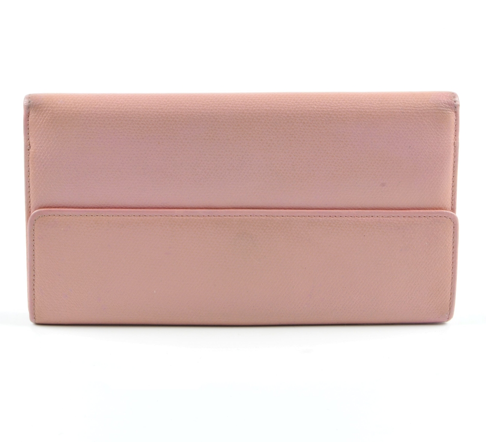 CHANEL - a pink leather wallet. The bifold wallet with press-stud fastening and pink enamel button - Image 2 of 5