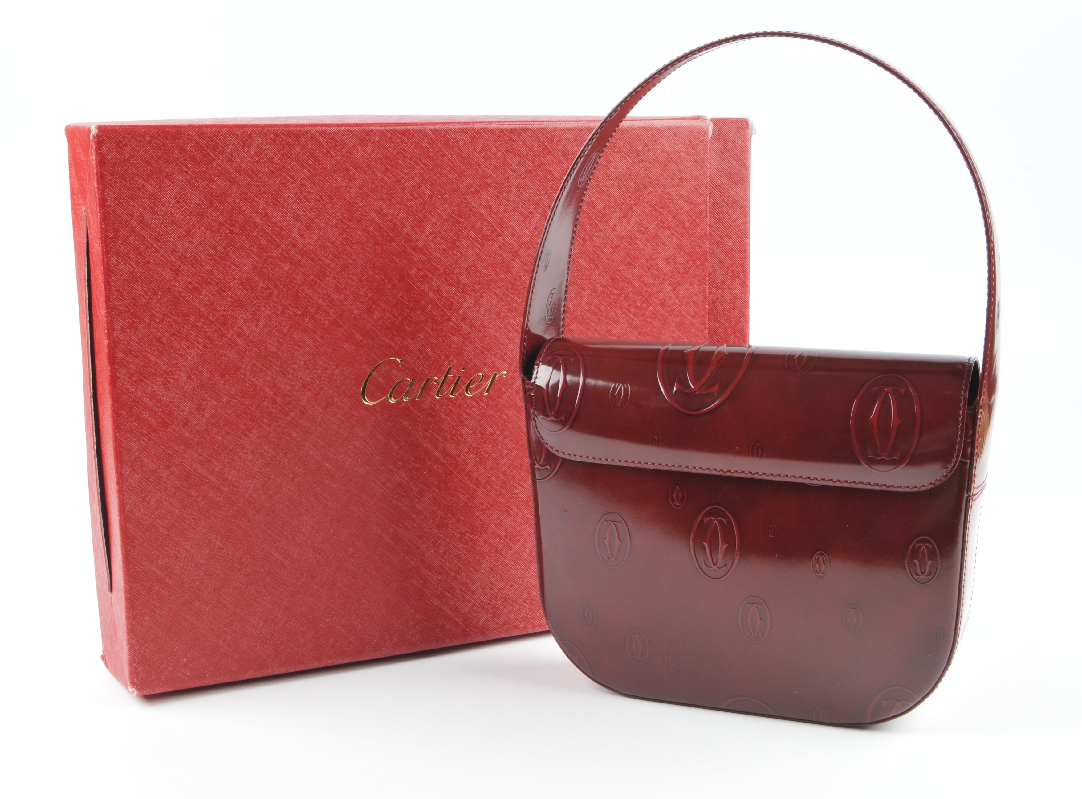 CARTIER - a Happy Birthday Bordeaux handbag. Designed with a structured shape, burgundy monogram - Image 5 of 5