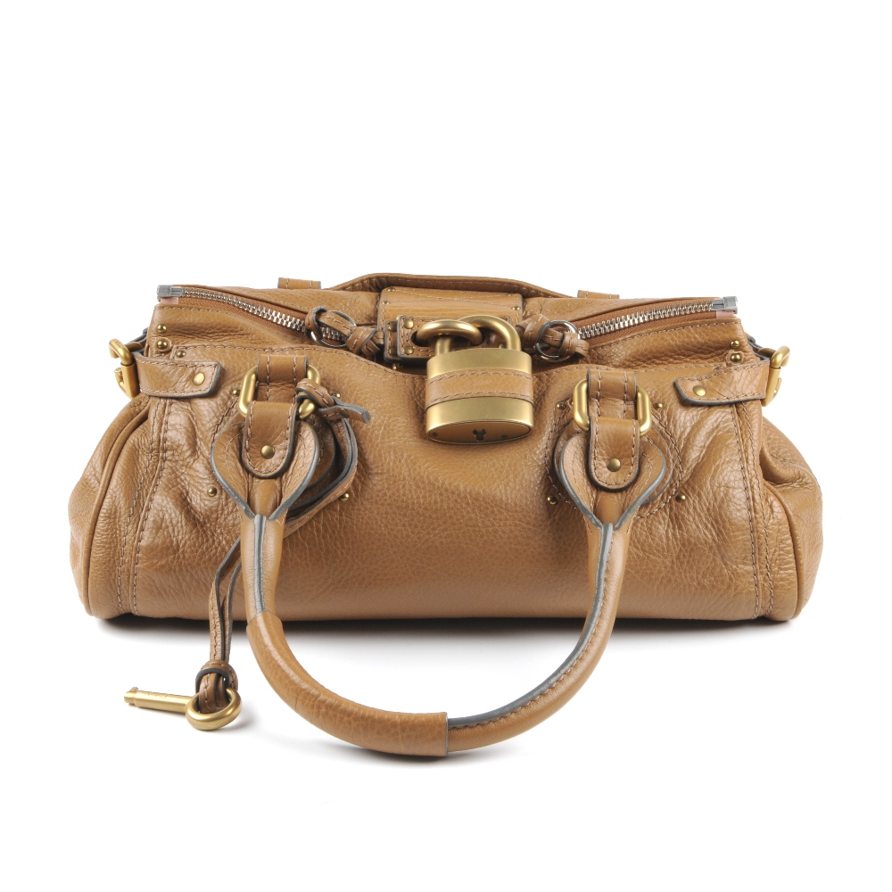 CHLOE - a tan Paddington handbag. Featuring a grained tan calfskin leather exterior, dual rolled