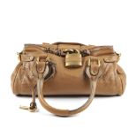 CHLOE - a tan Paddington handbag. Featuring a grained tan calfskin leather exterior, dual rolled